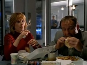 Brass and Catherine eating burgers